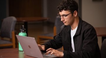 Student uses a laptop