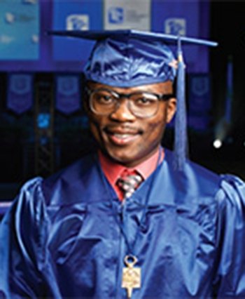 TCC OSU Transfer Student Jonathan Akuma in blue graduation cap and gown.