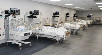 The Nursing Lab has four hospital beds with high-tech simulation manikins