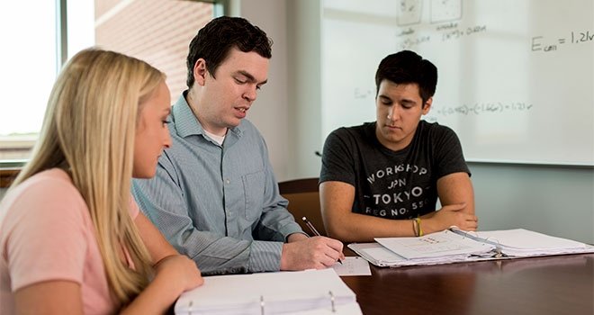Three TCC students studying at West Campus