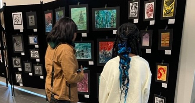 Students take in the artwork of Tulsa Public School Students