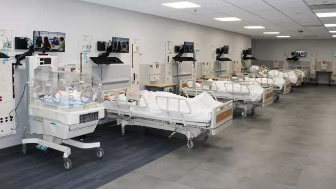 The Nursing Lab has four hospital beds with high-tech simulation manikins