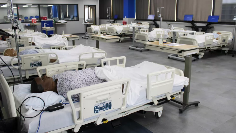 An expanded Nursing medical-surigical lab has a 10-bed simulation area.